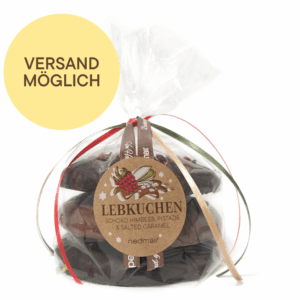 Packung mit frei gefüllten Elisenlebkuchen. Zwei mit Zartbitter Schokolade und einer mit Vollmilch Schokolade.
